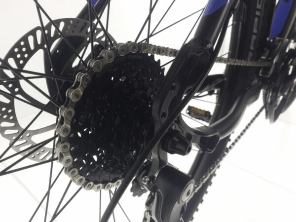 Close-up of a bicycle's drivetrain components.