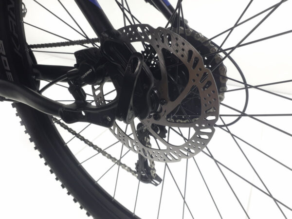 Close-up of a bicycle's disc brake system.