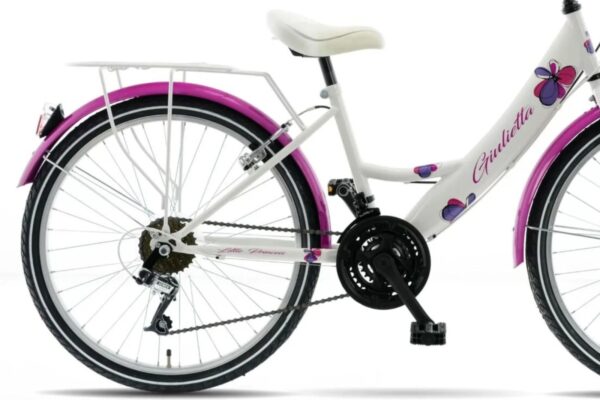 Vit och rosa cykel med blommönster för barn.