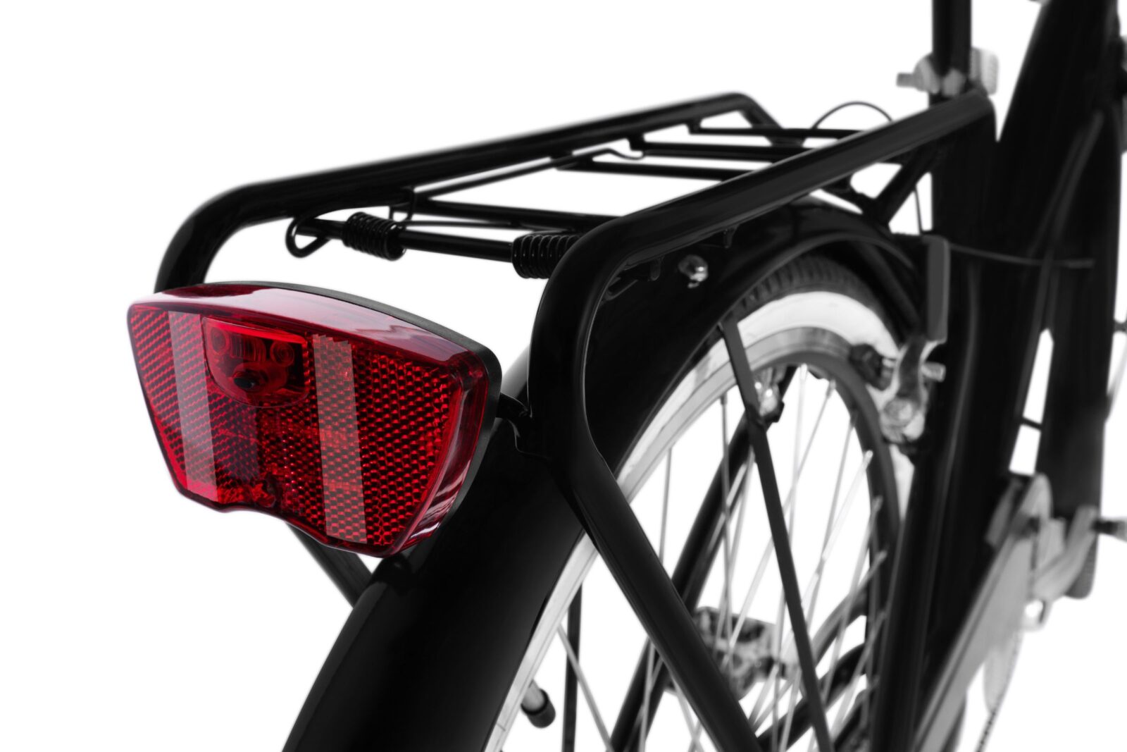 Cykelbaktänd lampa på pakethållare med reflexer