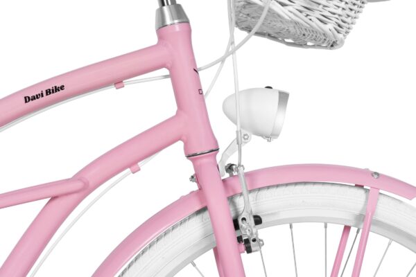 Rosa cykel med korg och belysning