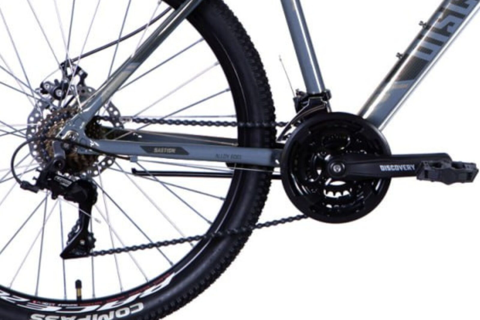 Close-up of a bicycle drivetrain and pedals.