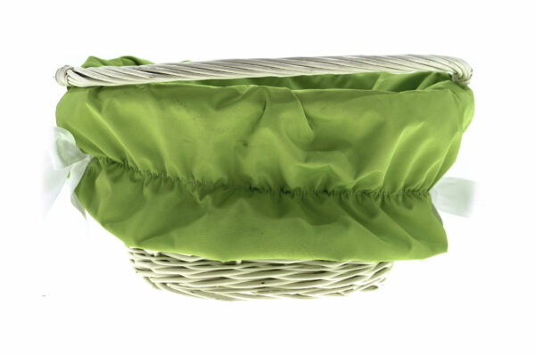 Vit korg med grön tyginredning