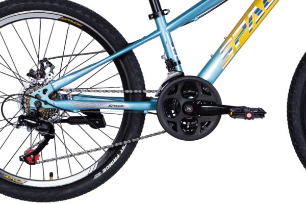 Close-up of a blue bicycle's drivetrain and pedals