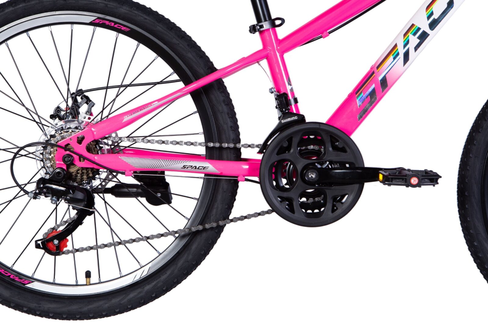 Close-up of a pink bicycle's drivetrain and pedals.