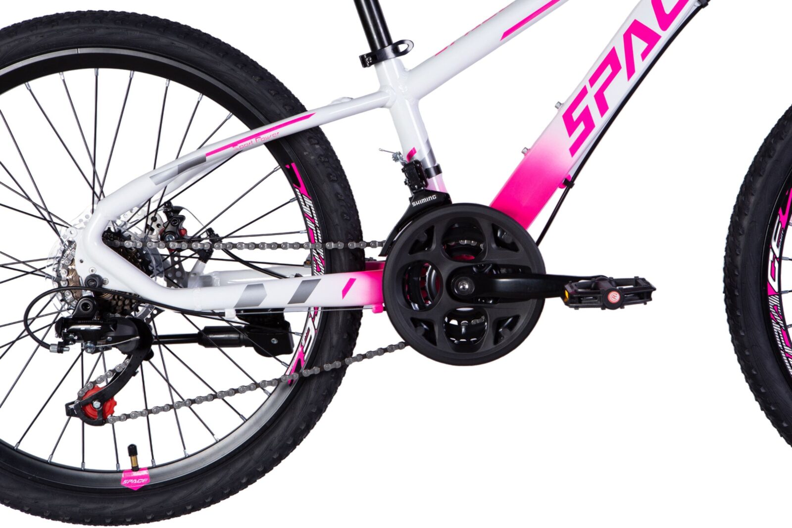 Close-up of a pink and white mountain bike.