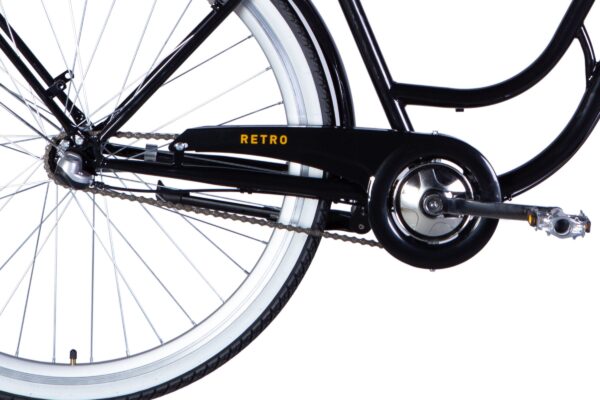 Svart retro cykel med vit däcksida