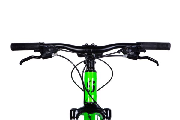Close-up of a green bicycle's handlebars.