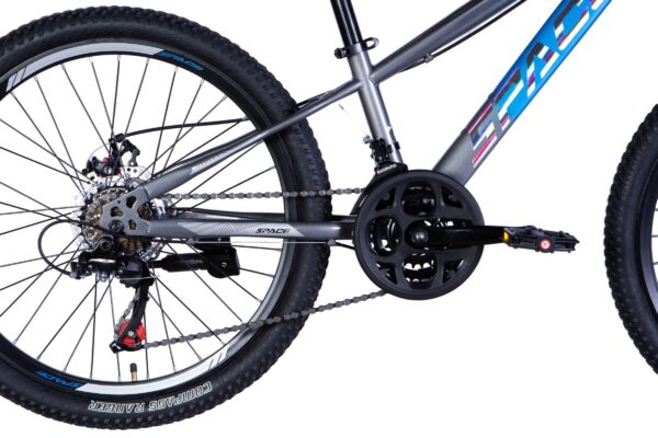 Close-up of a mountain bike's drivetrain and pedals.