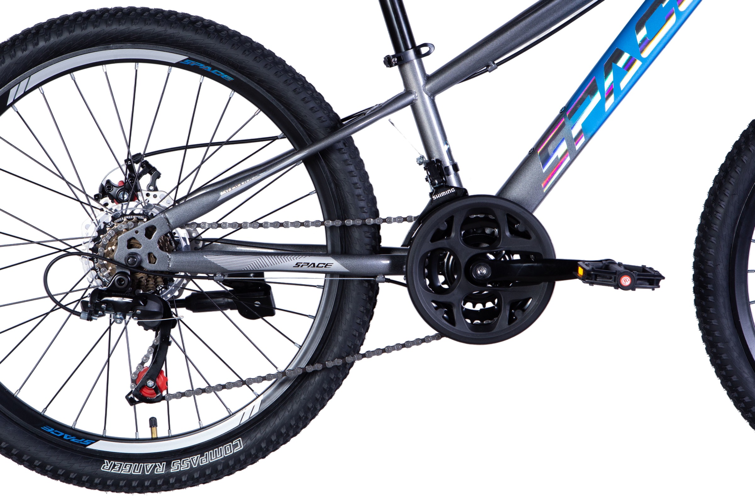 Close-up of a mountain bike's drivetrain and pedals.