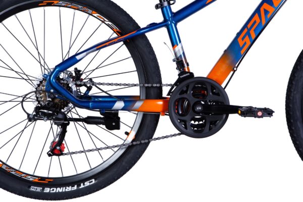 Close-up of a blue-orange mountain bike drivetrain.