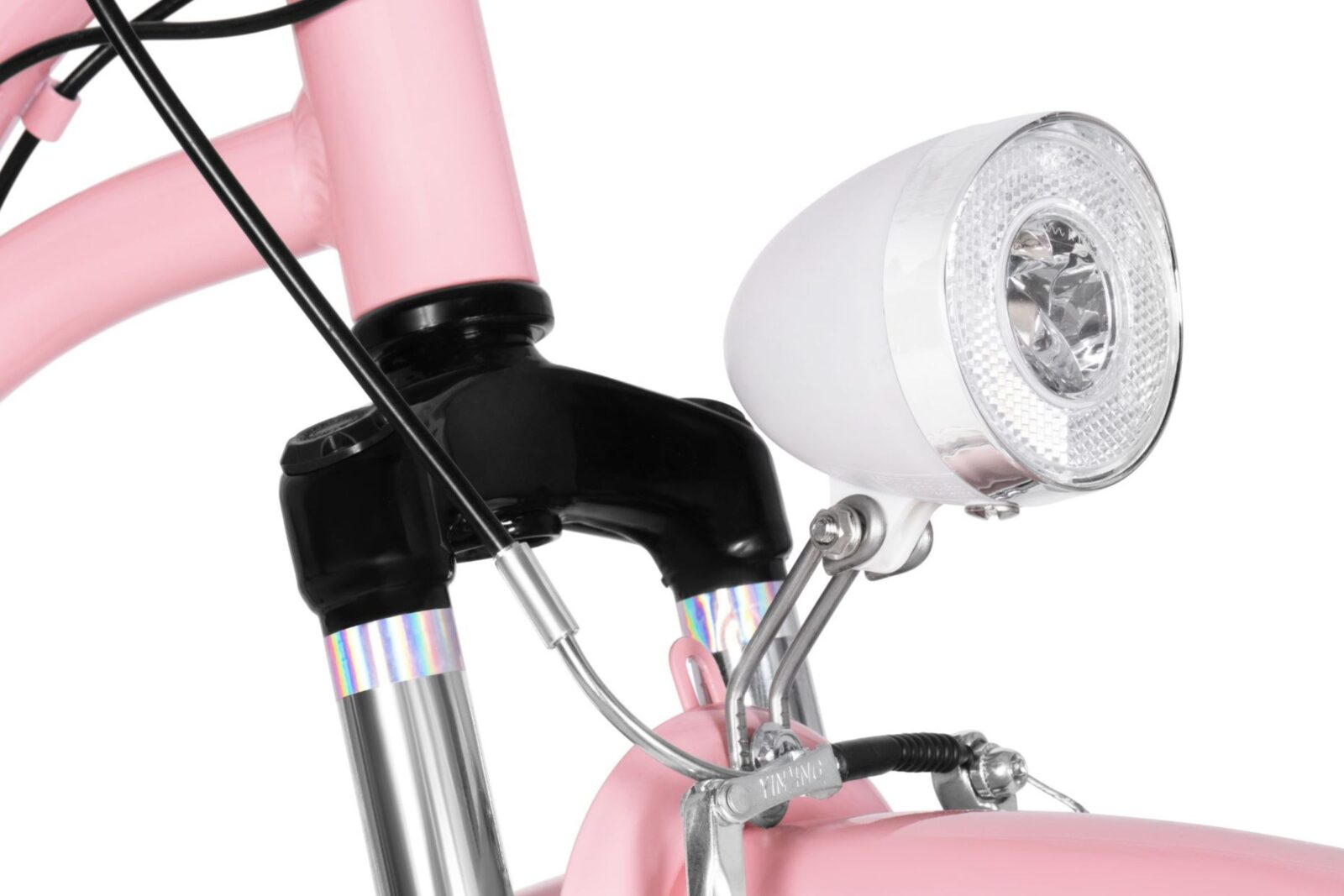 Rosa cykel med vit framlykta och kabel