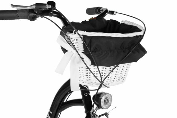 Cykelkorg med svart tyg och vit rosett