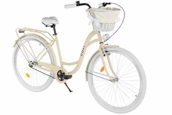 Beige cykel med vit korg på styret