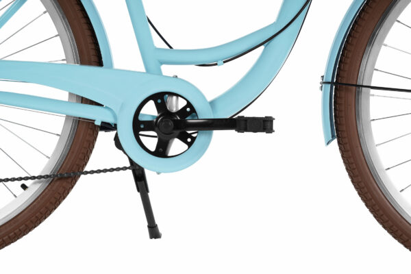 Close-up of turquoise bicycle drivetrain and pedals