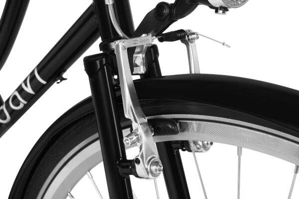 Close-up of bicycle front brake and wheel.