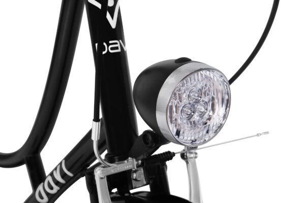 Close-up of bicycle front light and frame.