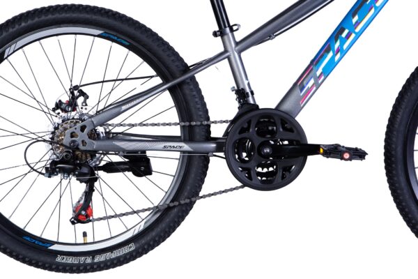 Close-up of a mountain bike's drivetrain and pedals.